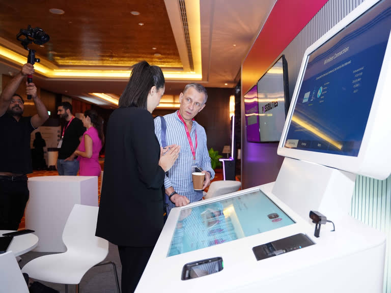 Visitors at an interactive exhibition display